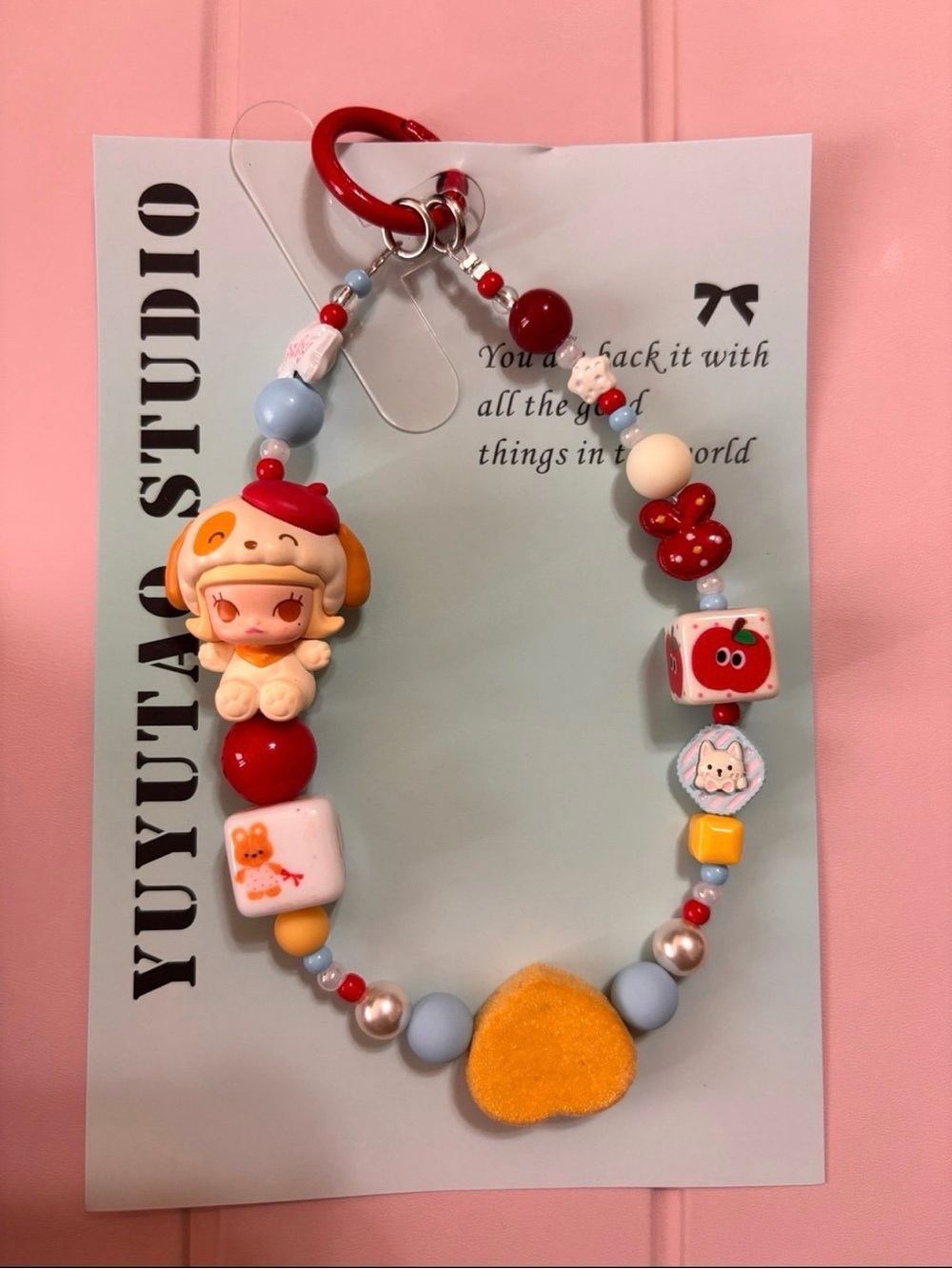 Cute Red & Pastel Beaded Charm Strap with Character Accent